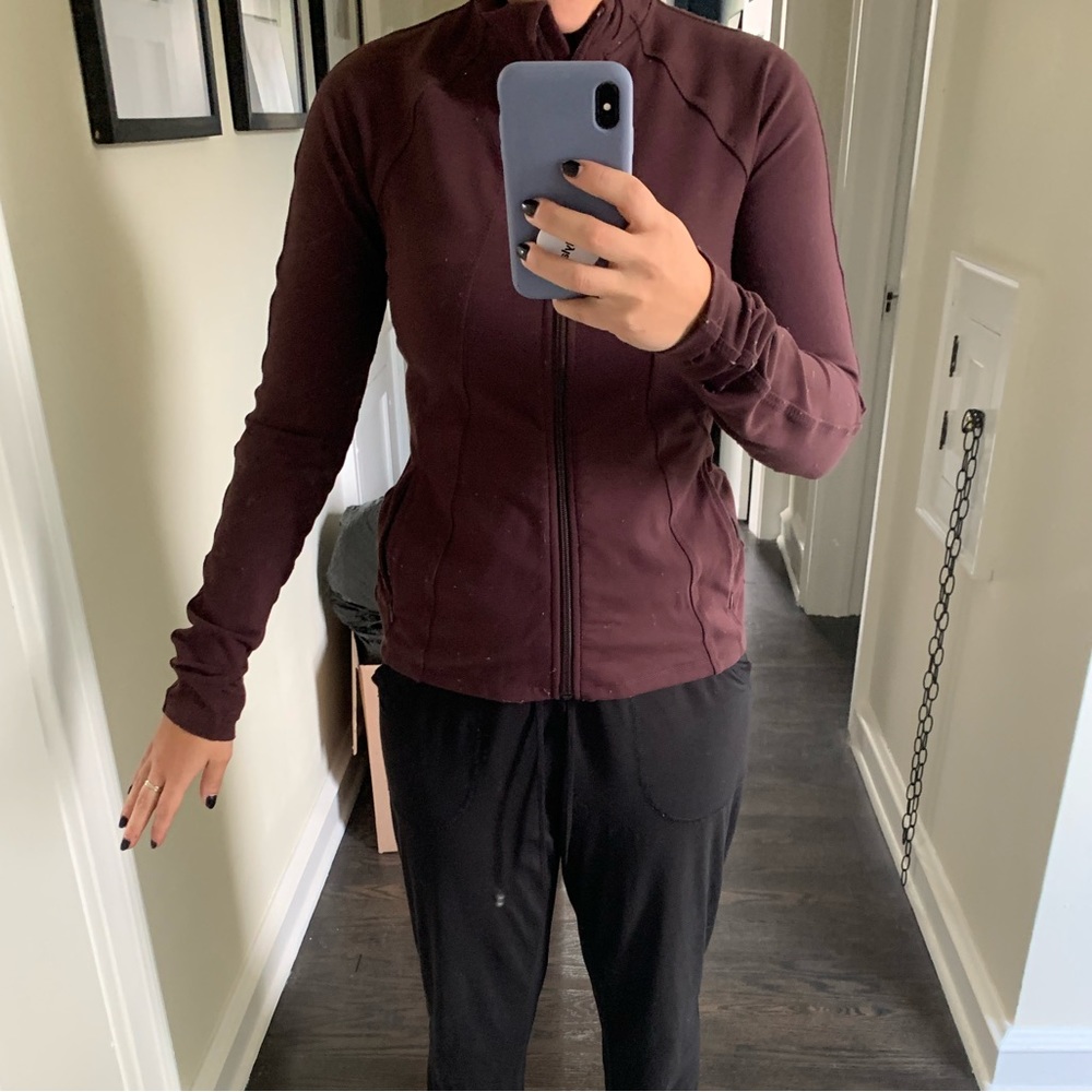Maroon tight zip up athleta jacket.